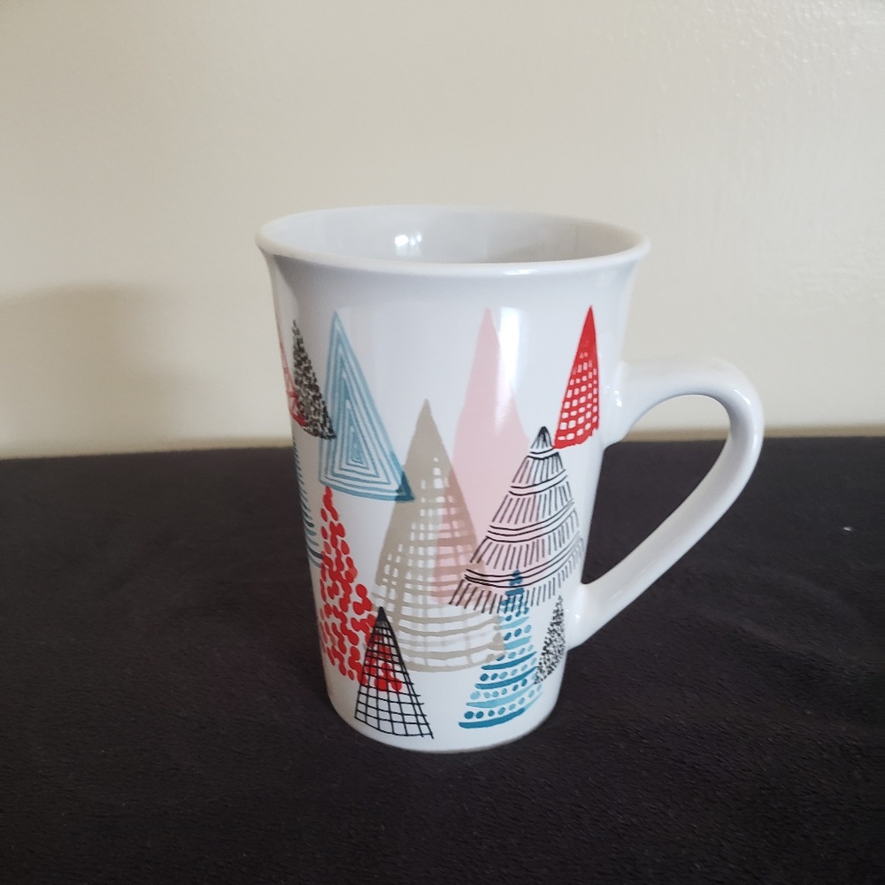 Starbucks 11 Ounce Christmas Tree Mug.